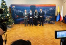 Katowicki TBS z 17,5 mln zł wsparcia. Nowe mieszkania i przedszkole powstaną przy ul. Kossutha 11 Ludzie stojący na tle zdjęcia panoramy miasta